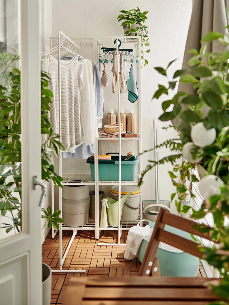 IKEA-a small wood and greenery balcony with room for both laundry and leisure 4