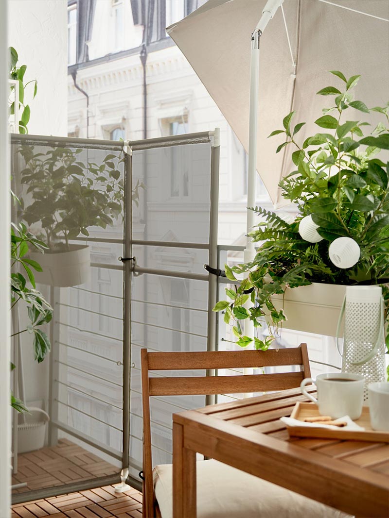 IKEA-a small wood and greenery balcony with room for both laundry and leisure 6